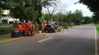 Perbaikan Jalan Metro Tanjung Bunga Makassar (Liputan6.com/Fauzan)