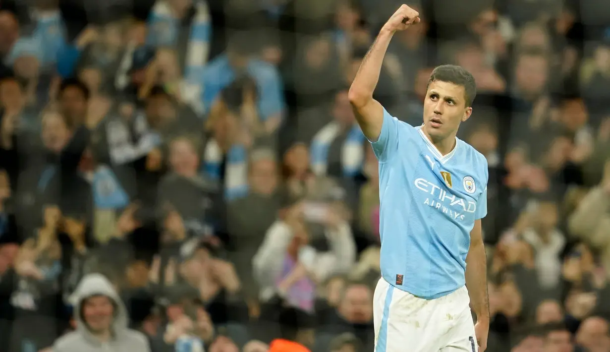 Skuad asuhan Pep Guardiola ini membuka pesta gol lewat aksi Rodri pada menit ke-11. (AP Photo/Dave Thompson)