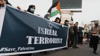 Ratusan Masyarakat Gorontalo Bentangkan Spanduk Bertuliskan Israel The Real Teroris/Foto.Istimewa (Arfandi Ibrahim/Liputan6.com)