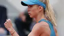 Gaya petenis Ukraina, Elina Svitolina mencetak angka saat melawan petenis Slovakia, Viktoria Kuzmova pada ajang Prancis Terbuka 2018 di Roland Garros stadium, Paris, (30/5/2018).  (AP/Thibault Camus)