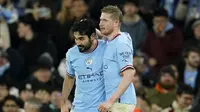 Selain lima gol yang dicetak Erling Haaland, dua gol lain Man City dalam kemenangan 7-0 atas RB Leipzig pada leg kedua 16 besar Liga Champions, Rabu (15/3/2023) dini hari WIB, dicetak oleh Ilkay Gundogan (kiri) dan Kevin de Bruyne (kanan). Man City lolos ke perempat final Liga Champions setelah menang agregat 8-1 atas RB Leipzig. (AP Photo/Dave Thompson)