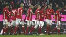 Para pemain Bayern Munich merayakan gol saat melawan RB Leipzig pada lanjutan Bundesliga Jerman di Stadion Allianz-Arena, (21/12/2016). Bayern menang 3-0.   (REUTERS/Michael Dalder)
