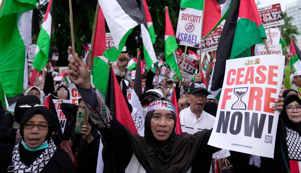 Aksi tersebut digelar dalam rangka memperingati 100 hari aksi genosida yang dilakukan Israel di Gaza, Palestina. (AP Photo/Dita Alangkara)