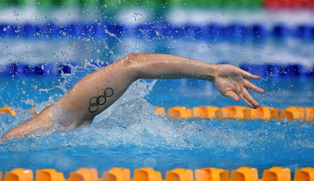 Joseph Schooling - Atlet renang andalan Singapura ini juga membuat tato di bagian tangannya. Prestasi paling membanggakan yang Joseph raih terjadi pada 2016 ketika ia berhasil menyumbang medali emas olimpiade pertama untuk negaranya. (Foto/Afp/Manan Vatsyayana)