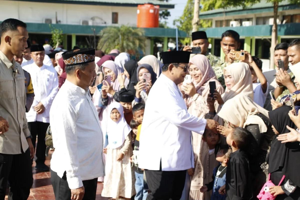 Kasatgas Tito saat mendampingi Presiden Prabowo Subianto melaksanakan salat Idulfitri 1447 H/2026 di Aceh Tamiang