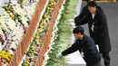 Peristiwa itu menewaskan 179 dari 181 penumpang. (JUNG YEON-JE/AFP)