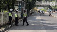Polisi lalu lintas berkumpul saat Operasi Zebra Jaya 2022 di Jakarta, Selasa (4/10/2022). Operasi Zebra Jaya dilaksanakan pada tanggal 3 hingga 17 Oktober untuk menekan jumlah pelanggaran lalu lintas. (Liputan6.com/Faizal Fanani)