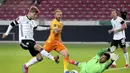 Penyerang Jerman, Timo Werner saat mencetak gol ke gawang Armenia pada pada pertandingan grup J Kualifikasi Piala Dunia 2022 di stadion Mercedes-Benz Arena di Stuttgart, Jerman, Senin (6/9/2021). Jerman kini berada di puncak klasemen dengan poin 12. (AP Photo/Matthias Schrader)