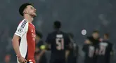 Raut kecewa pemain Arsenal, Declan Rice saat timnya kalah dari PSG dalam laga leg 2 semifinal Liga Champions 2024/2025 di Parc des Princes, Paris, Prancis, Rabu (07/05/2025) waktu setempat. (AP Photo/Aurelien Morissard)