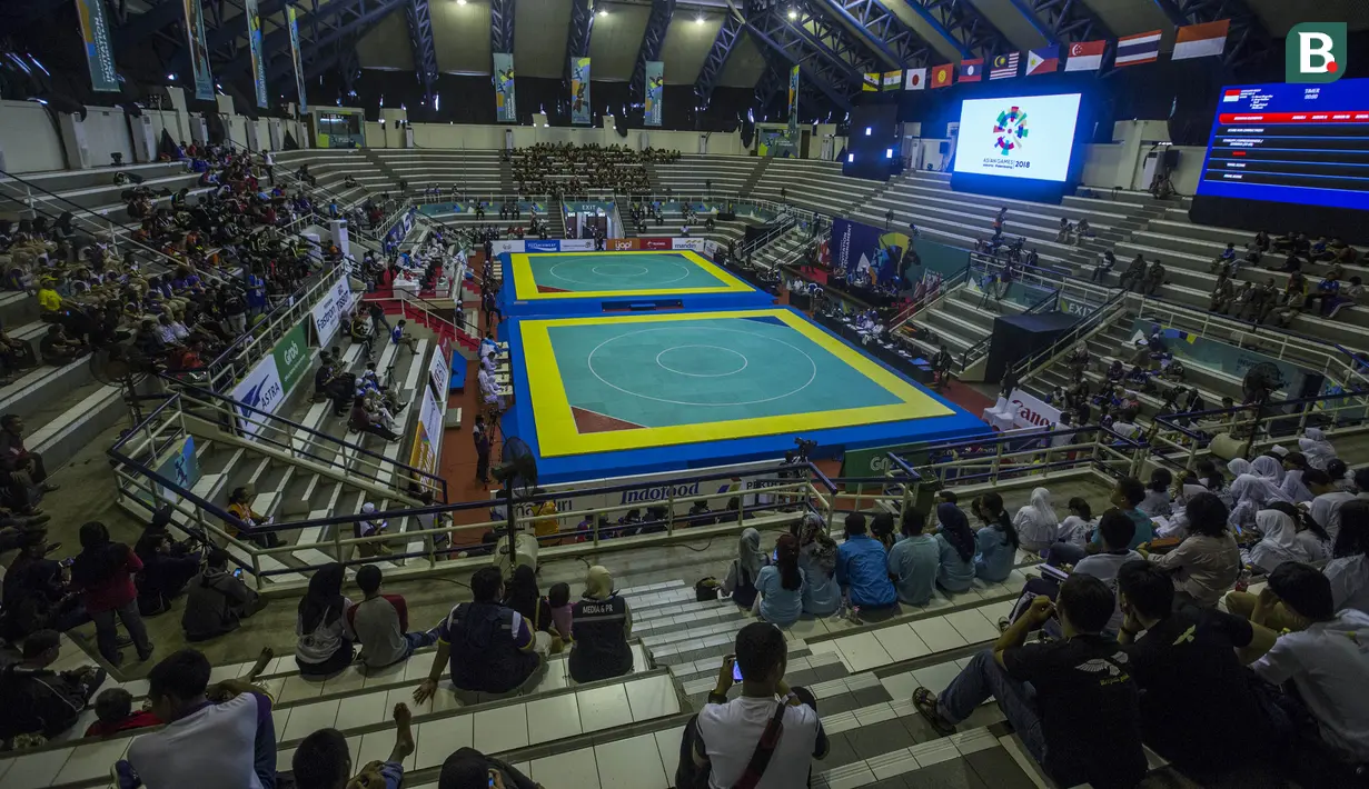 Suasana kemeriahan pada Invitation Tournament cabang pencak silat di Padepokan Pencak Silat, Jakarta, Rabu (14/2/2018). Event ini merupakan persiapan Asian Games 2018. (Bola.com/Vitalis Yogi Trisna)