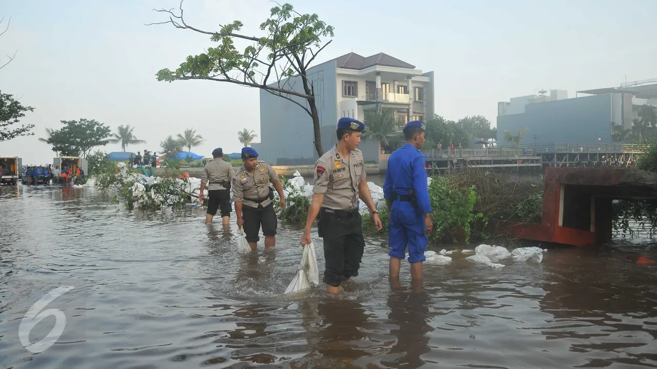 20160604-Akibat Tanggul Jebol Perumahan Pantai Mutiara Terendam Banjir