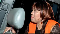 Pasti ditahan seusai diperiksa KPK sebagai tersangka. Saat keluar Gedung KPK, Kuningan, Jakarta, Pasti tampak mengenakan baju tahanan berupa rompi berwarna oranye, Jakarta, Jumat (8/8/2014) (Liputan6.com/Miftahul Hayat)