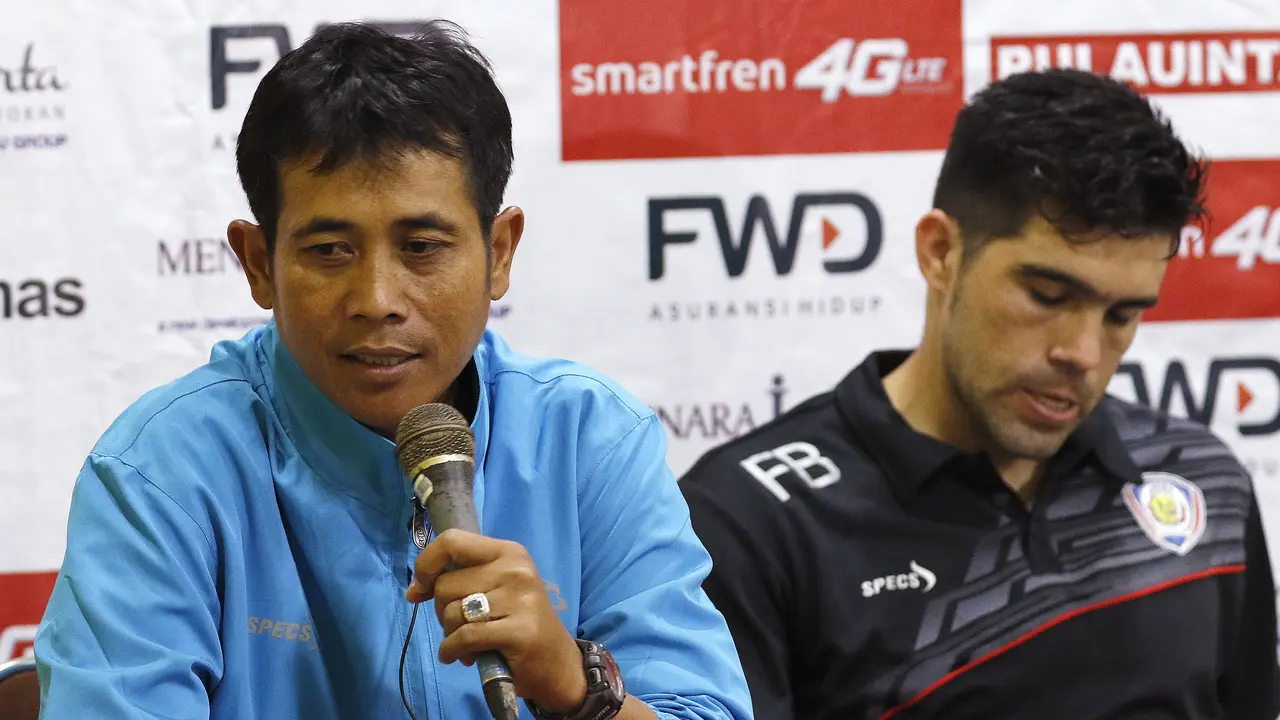 Pelatih Arema, Joko Gethuk Susilo dan kapten Fabiano Beltrame (Liputan6)