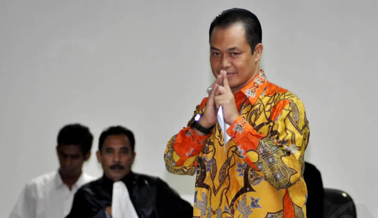 Muhtar Ependy mengikuti sidang perdana di Pengadilan Tipikor, Jakarta, Kamis (20/11/2014). (Liputan6.com/Miftahul Hayat)