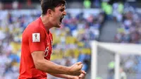 Ekspresi kebahagiaan bek Timnas Inggris, Harry Maguire usai menjebol gawang Swedia pada perempat final Piala Dunia 2018. (Fabrice COFFRINI / AFP)