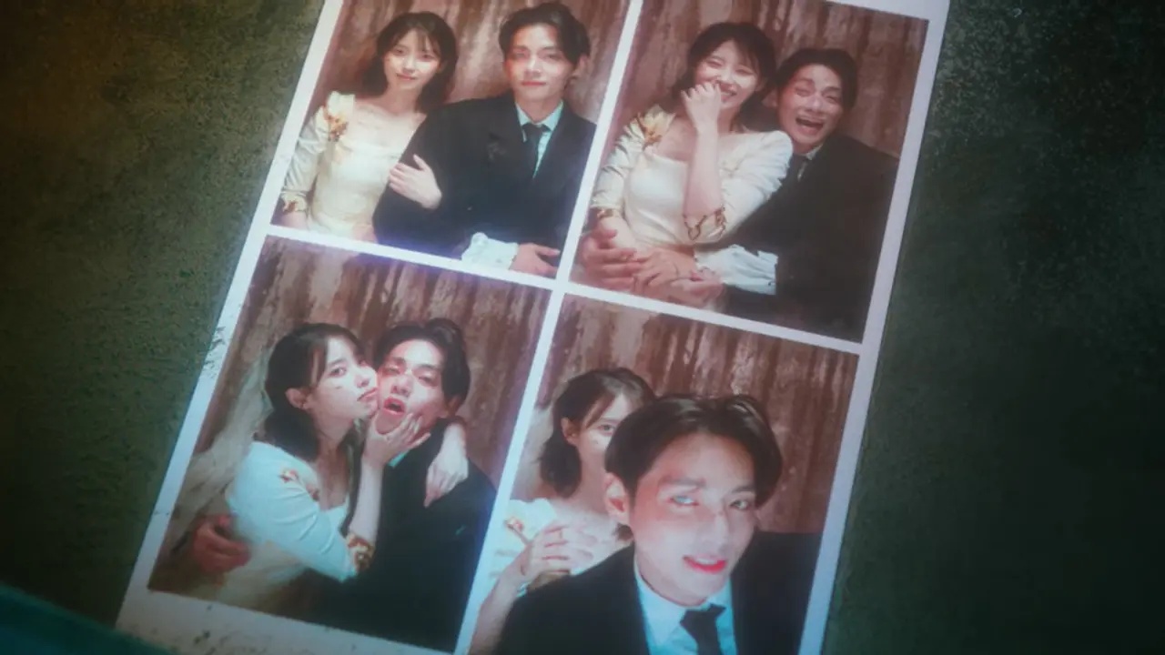 IU dan V BTS dalam video musik "Love Wins All". [Foto: YouTube/IU Official]
