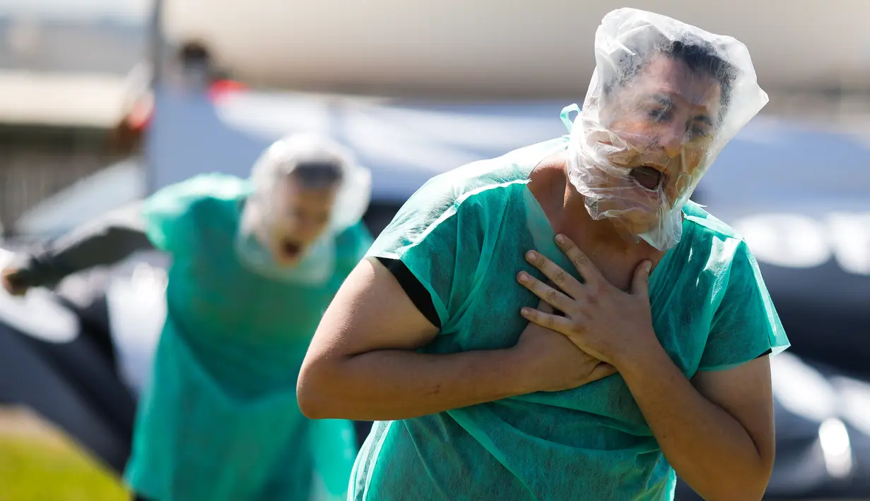 Demonstran memprotes Presiden Brasil Jair Bolsonaro dan penanganannya terhadap pandemi virus corona di Brasilia, pada Minggu (31/1/2021). Covid-19 yang telah merenggut lebih dari 223.000 nyawa menjadikan Brasil sebagai negara dengan jumlah kematian terbanyak kedua di dunia. (Sergio LIMA/AFP)