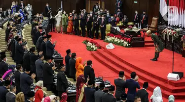 Presiden Joko Widodo memberi salam usai menyampaikan pidato kenegaraan pada Sidang Tahunan MPR dan Sidang Bersama DPR - DPD Tahun 2022 di Gedung Nusantara, Kompleks Parlemen, Senayan, Jakarta, Selasa (16/8/2022). Jokowi menyampaikan pidato kenegaraan dalam sidang tahunan MPR RI dan sidang bersama DPR RI dan DPD RI Tahun 2022. (Liputan6.com/Johan Tallo)