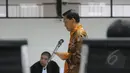 Didik Purnomo saat membacakan nota pembelaan di hadapan hakim dalam sidang lanjutan di Pengadilan Tipikor, Jakarta, Senin (30/3/2015).Sidang mengagendakan pembacaan nota pembelaan kasus korupsi pengadaan driving simulator. (Liputan6.com/Herman Zakharia)