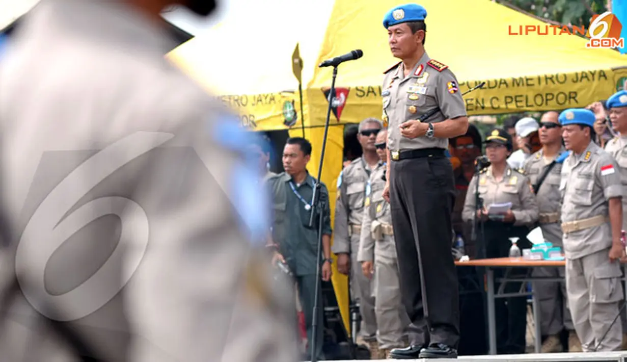 Dalam amanatnya, Kapolri menegaskan jika lebih baik mandi keringat dalam latihan daripada mandi darah di medan tugas tegas Jenderal Sutarman kepada personil FPU Indonesia VI (Liputan6.com/Helmi Fithriansyah) 