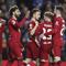 Penyerang Liverpool, Mohamed Salah (tengah) berselebrasi dengan rekan satu timnya setelah mencetak gol ke gawang Rangers selama pertandingan lanjutan Grup A Liga Champions di stadion Ibrox di Glasgow, Skotlandia, Kamis, 13 Oktober 2022. Salah mencetak tiga gol dan mengantar Liverpool menang telak atas Rangers 7-1. (AP Photo/Scott Heppell)