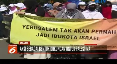 Massa protes kebijakan pemerintah Amerika Serikat yang dipimpin Trump dengan mengklaim secara sepihak Yerusalem adalah Ibu Kota Israel.