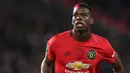 Paul Pogba - Pemain jebolan Akademi Manchester United ini termasuk dalam kategori pemain dengan kualitas di atas rata-rata. Pogba yang menjadi gelandang box to box andalan lini tengah ini telah melesatkan 24 gol dan 25 assist bersama The Red Devils. (AFP/Paul Ellis)