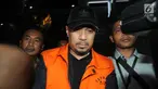 Kabid Pengembangan Jalan dan PPK di Dinas PUPR Kabupaten Muara Enim, Elfin Muhtar usai menjalani pemeriksaan di Gedung KPK, Jakarta, Selasa (3/9/2019). Enim Elfin resmi di tahan bersama Bupati Muara Enim Ahmad Yani terkait suap 16 proyek peningkatan pembangunan jalan. (merdeka.com/Dwi Narwoko)