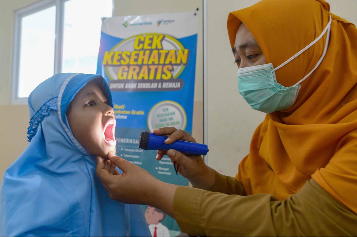 FOTO:  Antusias Murid SD Ikuti Cek Pemeriksaan Gratis di Sekolah