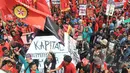Ribuan buruh menggelar aksi May Day di depan Istana Negara, Jakarta, Jum'at (1/5/2015). Mereka menolak Pasar Bebas yang menguntungkan negara Kapitalis. (Liputan6.com/Andrian M Tunay) 