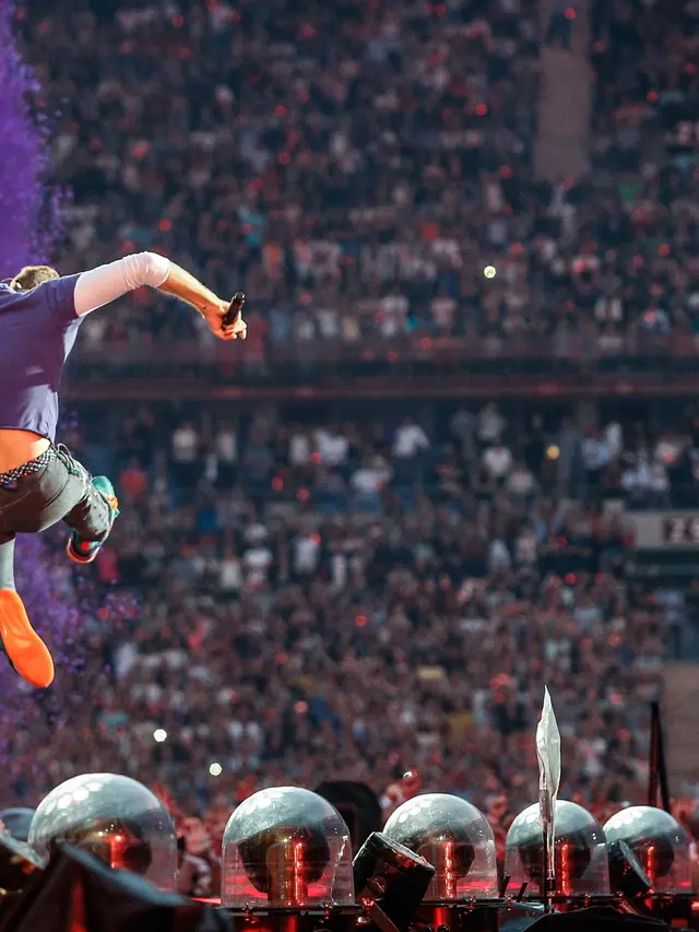 Penampilan Coldplay Berhasil Pukau Penggermar di Prancis