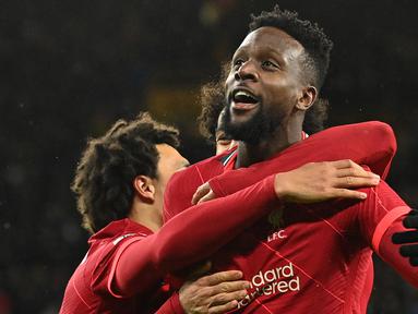 Divock Origi mendarat di Anfield pada 2014 lalu. Sepanjang kariernya, ia selalu mendapatkan persaingan berat dari rekan setimnya seperti Salah, Mane, dan Jota. Meski demikian Origi tak pernah gagal mempertahankan posisinya. Musim ini, ia bermain selama 533 menit untuk The Reds. (AFP/Justin Tallis)