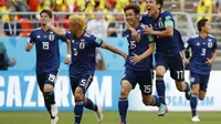 Jepang mencetak sejarah d Piala Dunia sebagai negara Asia pertama yang mampu mengalahkan tim Amerika Selatan setelah menang 2-1 atas Kolombia. (AFP/Jack Guez)
