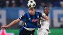 Di menit ke-56, Vinicius Junior berhasil mencetak gol kemenangan untuk Real Madrid. (Marco BERTORELLO/AFP)