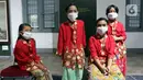 Siswa Sekolah Darurat Kartini saat memeriahkan dan memperingati Hari Kartini di Museum Kebangkitan Nasional (ex Gedung Stovia), Jakarta, Kamis (21/4/2022). Kegiatan tersebut digelar untuk memeriahkan dan memperingati Hari Kartini. (Liputan6.com/Herman Zakharia)