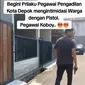 Tangkapan layar rekaman video oknum pegawai Pengadilan Negeri (PN) Kota Depok saat melakukan aksi koboi di kawasan Perumahan wilayah Bojongsari, Depok, Jawa Barat. (Foto: Istimewa)