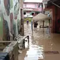 Rumah warga di Medan terendam banjir. Ketinggian air mencapai 100 cm