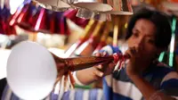Asal Muasal Tradisi Meniup Terompet Tahun Baru