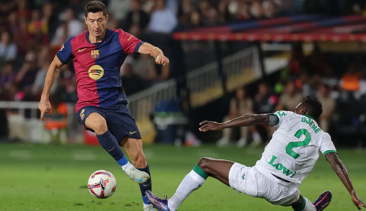 Kemenangan atas Getafe membuat Barcelona kian kokoh di puncak klasemen dengan raihan sempurna, 21 poin dari tujuh laga. (LLUIS GENE/AFP)