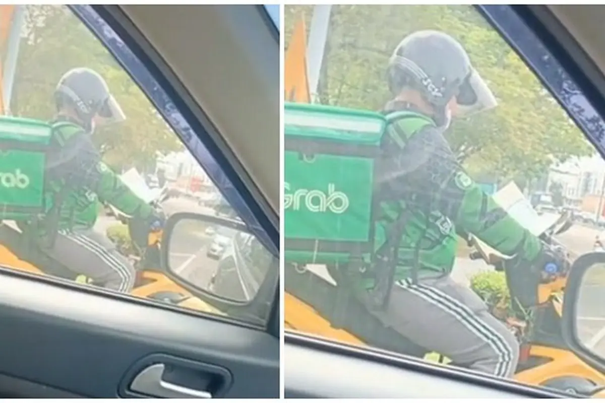 Viral Video Driver Ojol Baca Al-Qur'an saat Tunggu Lampu Merah, Banjir Pujian