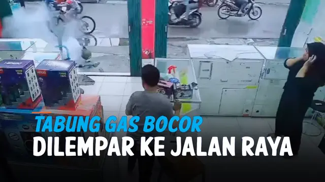 TABUNG GAS BOCOR, EH MALAH DILEMPAR KE JALAN RAYA