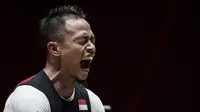 Lifter Indonesia, Suwoto Wijoyo, saat berlaga pada Asian Games di JIExpo, Jakarta, Senin, (20/8/2018). Suwoto Wijoyo berhasil menyumbang medali perunggu angkat besi putra kelas 56kg. (Bola.com/Vitalis Yogi Trisna)