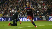 Suarez melakukan selebrasi usai jebol gawang Madrid (Reuters)