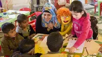 Sesame Street akan membantu memulihkan rasa percaya diri anak-anak pengungsi Suriah. (BBC)