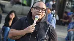 Igor Saykoji dalam Aksi 365 hari kasus Novel Baswedan yang tak kunjung terungkap di seberang Istana Negara, Jakarta, Rabu (11/4). Peserta aksi meminta pemerintah segera membentuk tim gabungan pencari fakta (TGPF). (Liputan6.com/Immanuel Antonius)