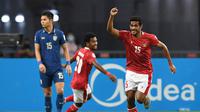 Gelandang Timnas Indonesia, Ricky Kambuaya ketika mencetak gol ke gawang Timnas Thailand di final Piala AFF 2020. (AFP/Roslan RAHMAN).
