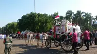 Kirab bendera pusaka dari Monas ke Istana (Liputan6.com/ Delvira Chaerani Hutabarat)