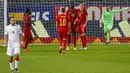 Pemain Belgia Christian Benteke (ketiga kanan) melakukan selebrasi usai mencetak gol ke gawang Belarusia pada pertandingan Grup E kualifikasi Piala Dunia 2022 di Stadion King Power, Leuven, Belgia, Selasa (30/3/2021). Belgia menang 8-0. (AP Photo/Francisco Seco)