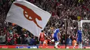 Pemain Arsenal, Theo Walcott merayakan golnya ke gawang Chelsea pada lanjutan Premier League di Emirates Stadium, Minggu (25/9/2016) dini hari WIB. (Reuters/Dylan Martinez)