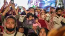 <p>Masyarakat menonton Festival Tabuh Bedug Malam Takbiran di Jakarta International Stadium (JIS), Jakarta, Minggu (1/5/2022). Festival Tabuh Bedug Malam Takbiran dimeriahkan 30 beduk yang ditabuh oleh sejumlah penabuh dari berbagai wilayah Kota Administrasi Jakarta dan Kabupaten Kepulauan Seribu. (Liputan6.com/Faizal Fanani)</p>